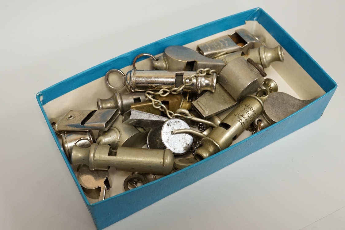 A collection of assorted penknives and whistles